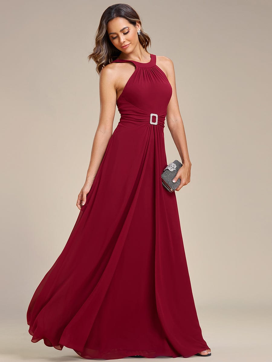 Elegant Halter Neck Pleated Chiffon Evening Gown with Waist Buckle Detail